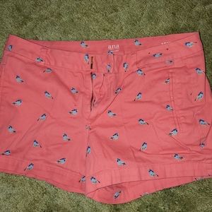 Pink shorts with birds on them
